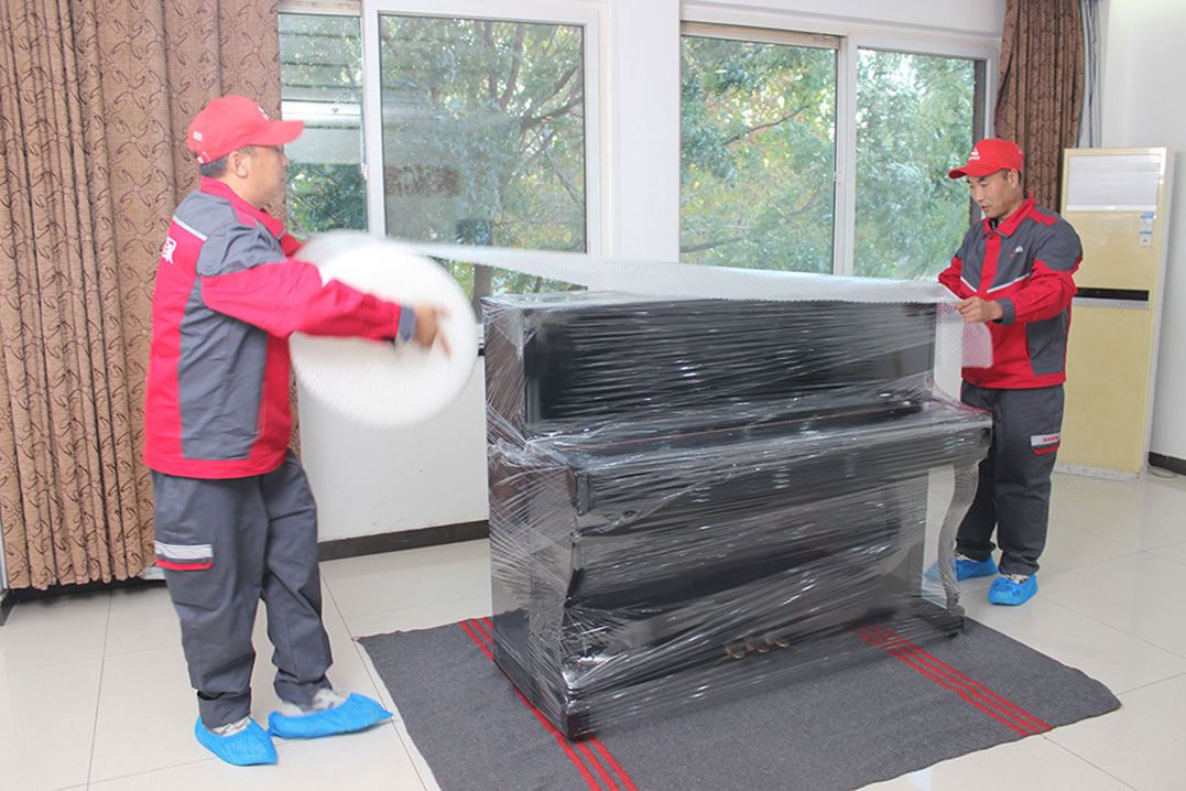 義烏喬喜搬家公司專業(yè)鋼琴搬運現(xiàn)場